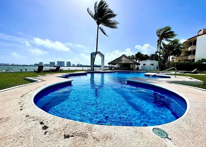 Luxurious Lagoon-Front Apartment In Hotel Zone Tranquility Meets Elegance Near Top Attractions And Beaches