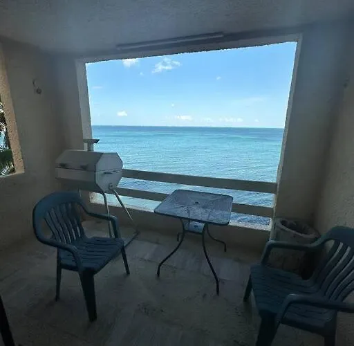 Escape To Serenity By The Sea! Beachfront Apartment With Pool, Just 5 Minutes From The Ferry